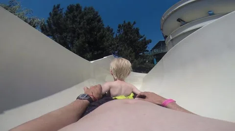 Father &amp; Son on Waterslide 1 Video stock 49583369