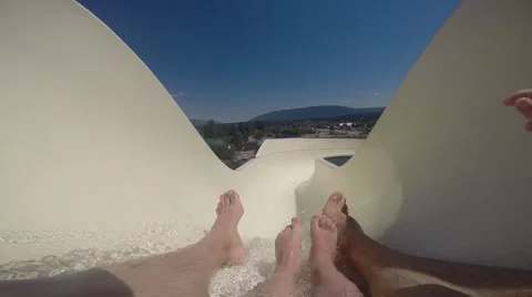 Father &amp; Son on Waterslide Video stock 49583581