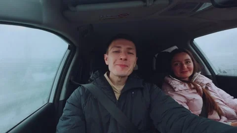 The father speaks to the camera in the car Stock Footage 290047393