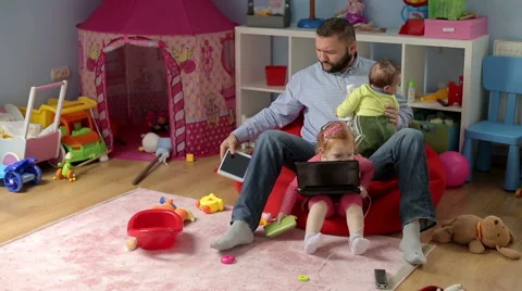 Father spend time with his son and daughter at home  Stock Footage 59940475
