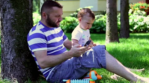 Father talk on the phone Video stock 64945305