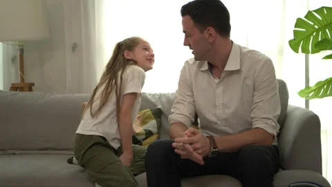 The father talked to his daughter, packed her school supplies in her backpack, Video stock 340910443