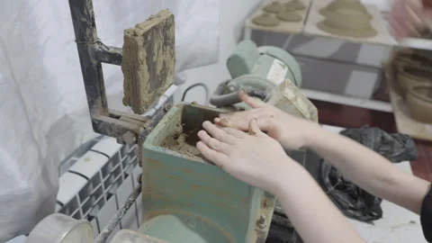 A father teaches his son to work with clay Stock Footage 294718521