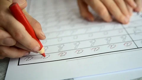 Father teaching child to write letters Stock Footage 121780975