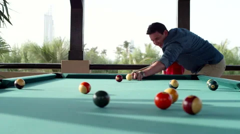 Father teaching his son billiards. Stock Footage 64107559