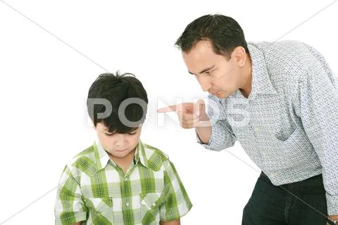 A father is threatening his little boy with a finger Stock Photos
