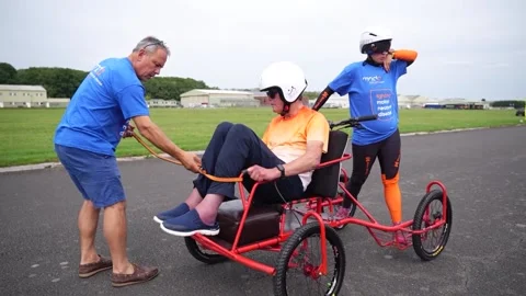 Father-of-three with MND breaks four wheelchair Guinness World Records in one d Video stock 316562013
