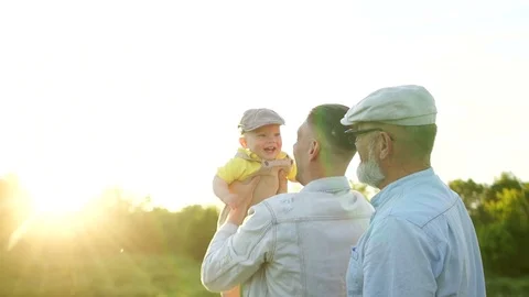 Father throws up a one year old baby. Father's day Happy family weekend Stock Footage 108488234