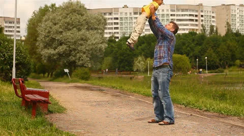 Father turns child's hands. Stock Footage 24759218