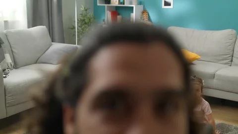 Father turns on timer on the camera and takes a photo of his wife and daughters Stock Footage 113964832