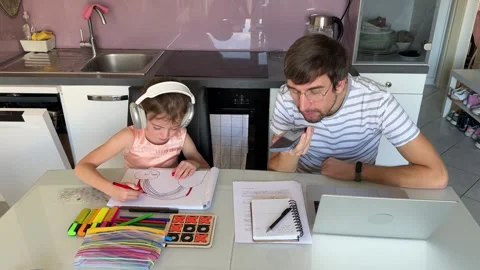 Father working from home while his daughter is drawing Stock Footage 309302158
