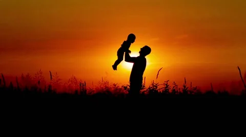 Fatherhood at sunset Stock Footage 53528016