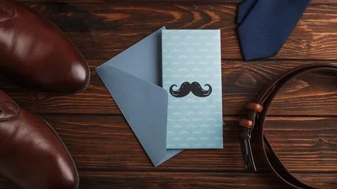 Father's Day concept flat lay with greeting card and accessories Stock Photos