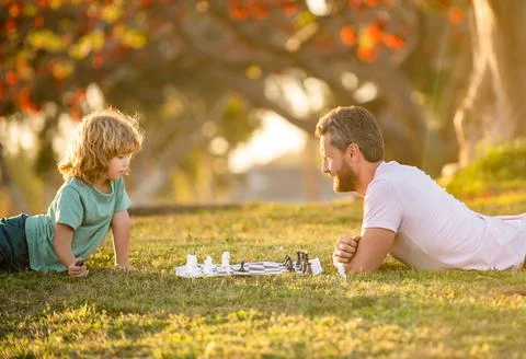 Fathers day. happy family. parenthood and childhood. checkmate. spending time Stock Photos