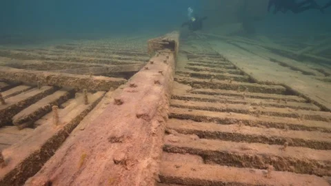 Fathom Five National Park - W.L. Wetmore Shipwreck, divers explore main decking Stock Footage 253429684