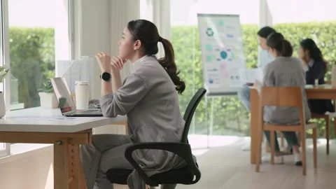 Fatigue worker work hard at office hybrid workplace burnout pensive ponder .. Stock Footage 317067254