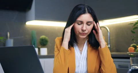 Fatigued concentrated attractive loaded with work woman sitting near computer Stock-Footage 149202776