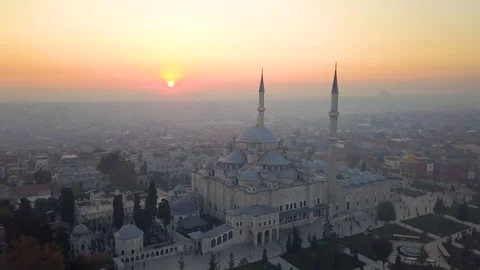 Fatih mosque flying close and passing at sundown Stock Footage 102589806