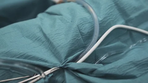 Fats in a tube at operation Stock Footage 120186544