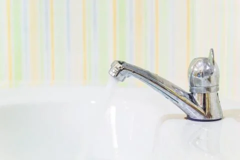 Faucet and basin Stock Photos