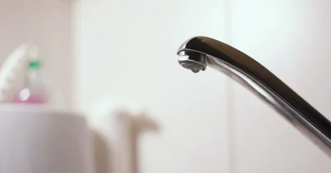 Faucet on and off close up Stock Footage 65889145