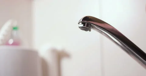 Faucet on and off close up Stock Footage 65889283