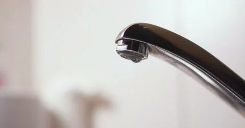 Faucet on and off close up Stock Footage 65889373