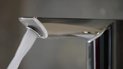 The faucet in the bathroom with running water. Stock Footage 247794494