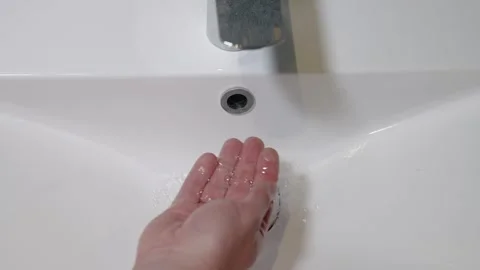 The faucet in the bathroom with running water. Stock Footage 247794766