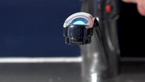 Faucet being turned on in Kitchen UK 4K Video stock 125073791