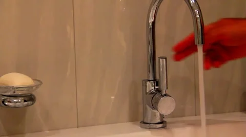 Faucet with cold or hot water Stock Footage 43145111