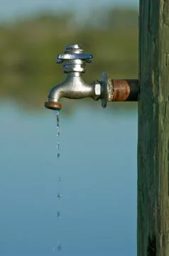 Faucet drip Stock Photos