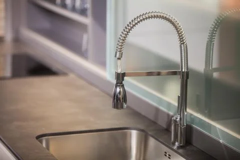 Faucet in a kitchen Stock Photos