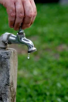 Faucet leaking water Stock Photos