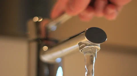 Faucet opening and closing close up Stockbeeldmateriaal 24821986