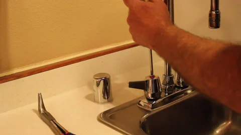 Faucet repair Stock Footage 34197356