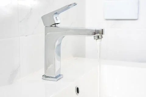Faucet in the Restroom Stock-Fotos