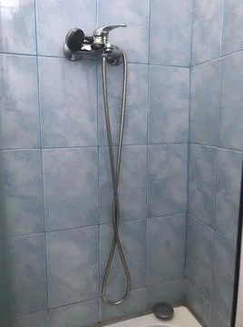The faucet shower interior of the bathroom. Stock Photos