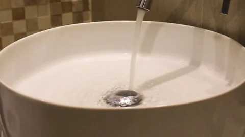 The faucet in the sink Stock Footage 249530607