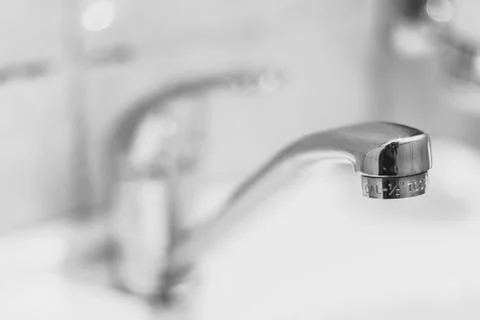 The faucet in the sink Stock Photos