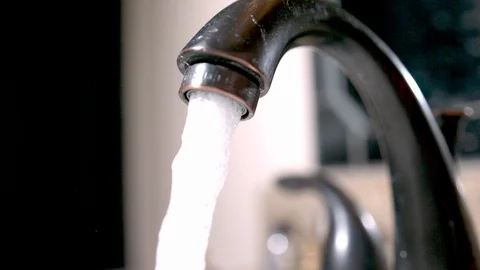Faucet Turns On at 1500fps Stock Footage 104849313