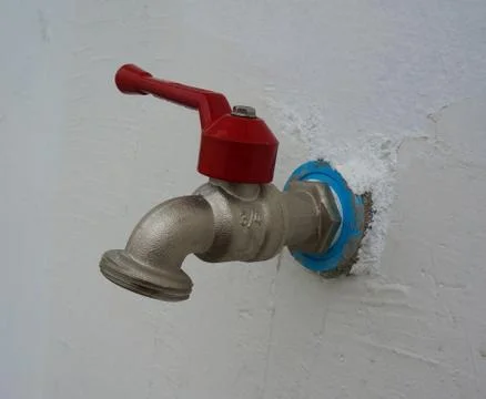 Faucet on wall Фото