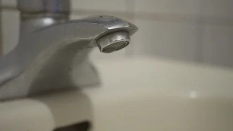 Faucet with water, close up. Stock Footage 97879389