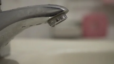 Faucet with water, close up. Stock Footage 97880365