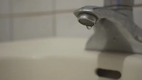 Faucet with water, close up. Video stock 97880414