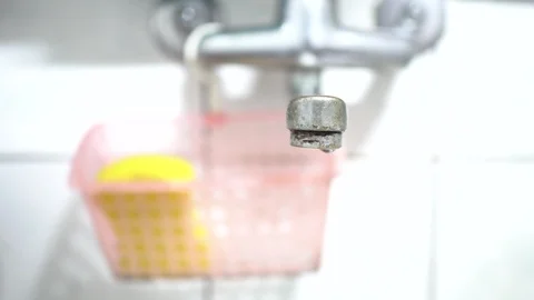 Faucet with water, close up. Stock Footage 98594657