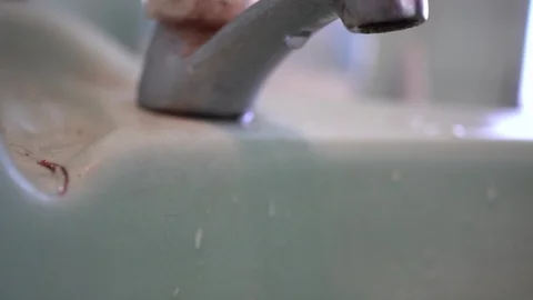 Faucet with water, close up. Stock Footage 100055483
