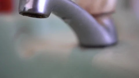 Faucet with water, close up. Video stock 100055815