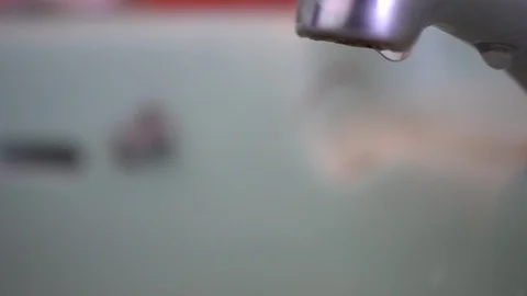 Faucet with water, close up. Stock Footage 100055895