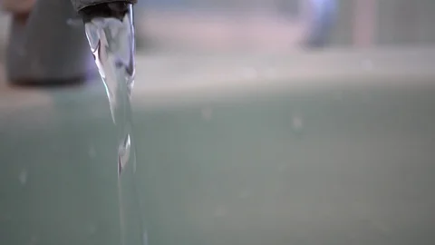 Faucet with water, close up. Stock Footage 100056138